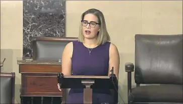  ?? Senate Television ?? ARIZONA SEN. Kyrsten Sinema is one of two key moderate Democrats opposed to changing filibuster rules to help pass dual voting rights bills. “I hope we get this done, but I’m not sure,” President Biden said.