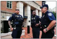  ?? AP/MANUEL BALCE CENETA ?? Security officers from the Department of Homeland Security’s Federal Protective Service keep watch Tuesday at the federal courthouse in Alexandria, Va., as Paul Manafort’s trial gets underway.