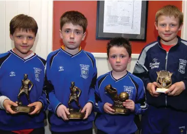  ??  ?? Tom Reilly, Jamie and Stewart Mc Donnell and Joe Sweeney won trophies at the Boyne Rovers Awards night in the Bridgeford