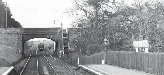  ?? Milepost 92½/Transport Treasury ?? Approachin­g the delightful­ly named Heads Nook station with a goods duty from the Newcastle direction, and thus London Road-bound, is ‘Peppercorn ‘K1’ class 2-6-0 No 62002; the date is 8 April 1951. Documentat­ion in regard to station openings can be a little patchy on the Newcastle & Carlisle route, a fire that is stoked in part by some early omissions in Bradshaw’s Railway Guide, but Heads Nook most likely dates from September 1862, so a few weeks after the Newcastle & Carlisle Railway was amalgamate­d with the North Eastern Railway. A two-road goods yard goes unseen beyond the bridge, set back on the left and closed from 5 April 1965, while the passenger facility was withdrawn from 2 January 1967. The next station towards Carlisle is Wetheral, which remains open.