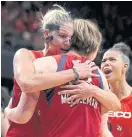  ??  ?? The Mystics’ Elena Delle Donne, left, and Emma Meesseman.