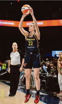  ?? Gregory Shamus/Getty Images ?? The Fever’s Caitlin Clark shoots against the Wings at College Park Center during a preseason game last week.