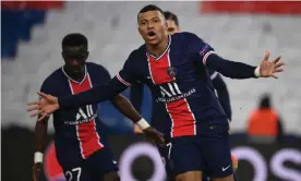  ??  ?? Kylian Mbappé celebrates after scoring a penalty for Paris Saint-Germain in the first half against Barcelona. Photograph: Franck Fife/AFP/Getty Images