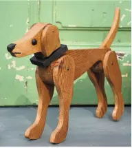  ??  ?? Millie wooden dog £48, www.deepuddy.co.uk