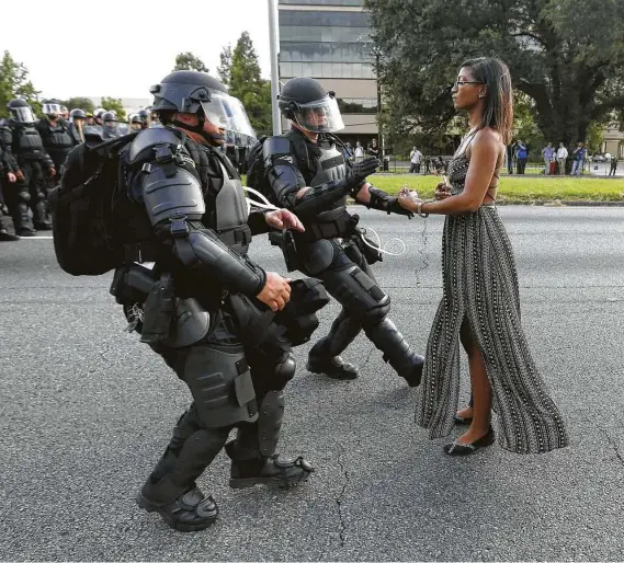  ?? Courtesy of UNAFF / Reuters ?? A scene from Michael Nagler’s documentar­y about nonviolent activism, “The Third Harmony,” illustrate­s how police deem Black and brown Americans a threat.