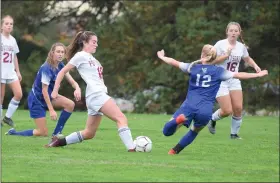  ?? AUSTIN HERTZOG - MEDIANEWS GROUP ?? Pottsgrove’s Avery Makoid gets a boot in before Villa Joseph Marie’s Kennedy Kilchrist (12) can get her shot off during Monday’s District 1-3A semifinal.