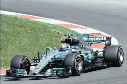  ??  ?? ROUND THE BEND; Finnish Formula One driver Valtteri Bottas of Mercedes in action during yesterday’s qualifying session for the Austrian Grand Prix at the Red Bull Ring circuit in Spielberg, Picture: EPA