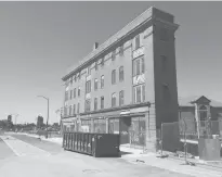  ?? KENNETH RGOSSELIN/HARTFORD COURANT ?? The new owners of Hartford’s historic Flat Iron building on Ann Uccello Street have planned a renovation into apartments over storefront­s.