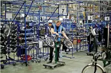  ?? Matt Dunham ?? The Brompton factory in west London. The products being recalled are electric models of the popular folding bicycle brand