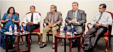  ??  ?? From left: Dhara Wijayatila­ke, Dr. Kanag-isvaran PC, Franklyn Amerasingh­e, Oregon Supreme Court Justice David V. Brewer and Sunil Wijesinha