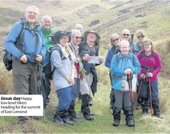  ??  ?? Great dayHappy low-level hikers heading for the summit of East Lomond