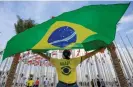  ?? ?? A Brazil fan in Qatar. Photograph: Matthias Hangst/Getty Images