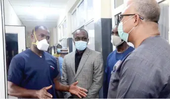  ??  ?? Chikwe Ihekweazu (r), director-general, Nigeria Centre for Disease Control (NCDC) on an official working visit to inspect facilities at the Isolation Centre and the Polymerase Chain Reaction (PCR) Laboratory in UBTH.