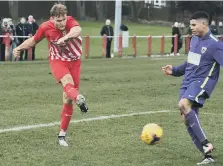  ??  ?? Ryhope CW’s Corey Nicholson fires in a shot against Guisboroug­h.