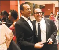  ?? Dan Haar / Hearst Connenctic­ut Media ?? State Treasurer Shawn Wooden, center, with Alan Lazowski, chairman and CEO of LAZ Parking, one of the nation’s largest parking companies, at the inaugural ball in Hartford on Wednesday night. Lazowski founded LAZ in 1981 when he was a student at UConn. He and Wooden and neighbors and friends.