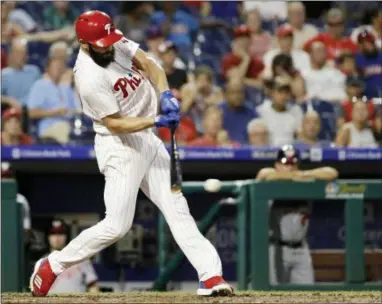  ?? MATT SLOCUM — THE ASSOCIATED PRESS ?? Phillies pitcher Jake Arrieta connects on a two-run single off Nationals starter Gio Gonzalez during the second inning of an 8-6 victory over Washington Wednesday at Citizens Bank Park.