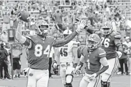  ?? JOHN RAOUX/AP ?? Florida tight end Kyle Pitts celebrates a 4-yard touchdown catch against South Carolina.