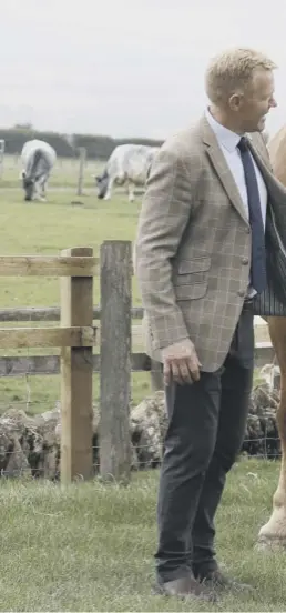  ??  ?? RARE BREED: Prince Charles meets Victoria, a Suffolk Punch horse during a visit to Cotswold Farm Park. The visit highlights the important work being done to preserve British native breeds