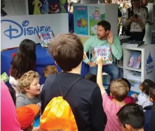  ?? (Submitted photo) ?? In this picture, Disney animator Andy Harkness participat­es in the 2016 Los Angeles Times Festival of Books with his book “Bug Zoo.” Harkness is from Starkville and is making a trip home.