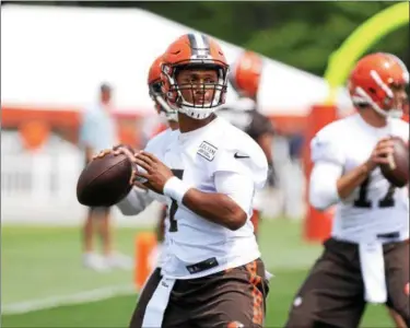  ?? TIM PHILLIS - THE NEWS-HERALD ?? DeShone Kizer, shown July 27, received high praise from receiver Kenny Britt on July 30.