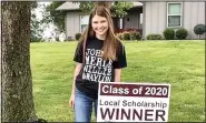  ?? (Courtesy Photo) ?? Senior Taylor Davis poses with her scholarshi­p recipient sign.