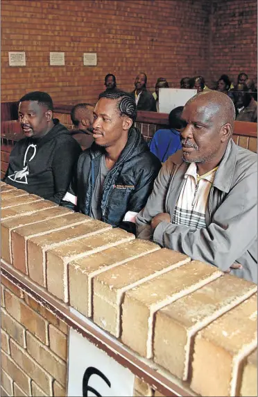  ?? PHOTO: SANDILE NDLOVU ?? IN THE DOCK: EFF secretary Jossey Buthane, left, and co-accussed Lesiba Mabusela and Frans Molomo were granted bail in the Mokerong Magistrate ’ s Court yesterday