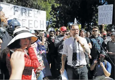  ?? AP PHOTO ?? Gavin McInnes speaks at a rally for free speech Thursday, April 27, 2017, in Berkeley, Calif. Demonstrat­ors gathered near the University of California, Berkeley campus amid a strong police presence and rallied to show support for free speech and condemn the views of Ann Coulter and her supporters.