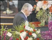  ??  ?? Gov. Steve Sisolak walks after speaking during the funeral service for Assemblyma­n Tyrone Thompson.