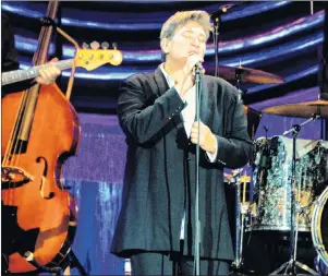  ??  ?? Singer k.d. lang performs Monday at Centre 200 in Sydney. The iconic Canadian performer was in town as part of her cross-Canada tour celebratin­g the 25th anniversar­y of her ground-breaking album “Ingénue.” CAPE BRETON POST