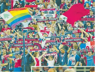  ?? STAFF PHOTOS BY STUART CAHILL ?? ALL REVVED UP: Revs fans, seen at last night’s game, might get even more excited if team owner Robert Kraft, right with son Jonathan, gives the thumbs-up to a new stadium.