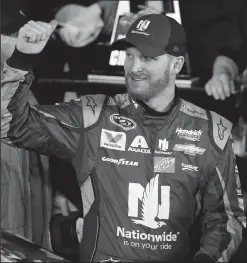  ?? STEPHEN M. DOWELL/TRIBUNE NEWS SERVICE ?? Dale Earnhardt, Jr. celebrates after winning the first of twin qualifying races for the Daytona 500 at Daytona Internatio­nal Speedway on Feb. 18 in Daytona Beach, Fla.