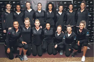  ?? PHOTO: GETTY IMAGES ?? All together now . . . The Silver Ferns pose for a group photo during the squad announceme­nt in Auckland yesterday.