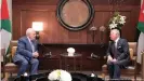  ??  ?? High hopes for Biden: Palestinia­n Authority President Mahmoud Abbas (left) and King Abdullah met in June