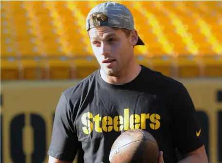  ?? John Heller/Post-Gazette ?? Shaun Suisham went from Steelers kicker to girls hockey coach.