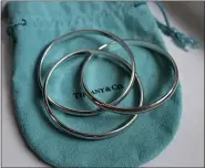  ??  ?? An interlocki­ng silver Tiffany & Co. bracelet is up for auction. COURTESY OF HUNTER REESER