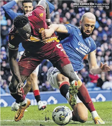  ?? ?? WELL EARNED WIN Mugabi helped the Steelmen to a huge Ibrox victory