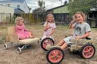  ??  ?? Jordan Watson’s daughters Nala, 2, Alba, 5, and Mila, 7, get to grips with their new wheels.
