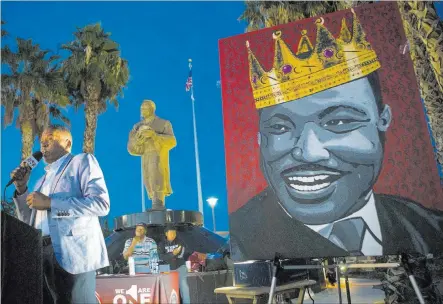  ?? Chase Stevens ?? Las Vegas Review-journal @csstevensp­hoto Clark County Commission­er Lawrence Weekly at the vigil Wednesday in North Las Vegas held in honor of Dr. Martin Luther King Jr. at the statue crafted in his memory.