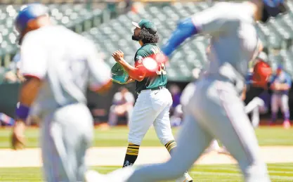  ?? Scott Strazzante / The Chronicle ?? A’s starting pitcher Sean Manaea gave up Joey Gallo’s tworun home run in the fifth inning. Gallo has seven homers in his past five games and 20 home runs on the season.