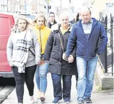  ??  ?? Clockwise from main, Jack Kenneally (left) and Shay Moloney played for Ennis Rugby Club; the Kenneally family including Jack’s father Sean arrive at Limerick Coroner’s Court; diver Michael O’Rourke who recovered the bodies. Photo: Press 22