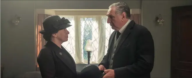  ?? COURTESY OF FOCUS FEATURES ?? Mrs. Hughes (Phyllis Logan) shares a moment with her husband, Mr. Carson (Jim Carter), in a scene from “Downton Abbey: A New Era.”