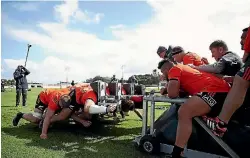  ?? PHOTO: GETTY IMAGES ?? The All Blacks engage in serious scrum practice in Auckland last month.