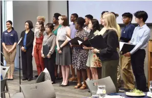  ?? The Sentinel-Record/Donald Cross ?? The ASMSA Choir performs during Friday’s luncheon.