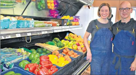  ?? DESIREE ANSTEY/ JOURNAL PIONEER ?? Darcia and Jordon Burnett turn over a new leaf and go back to their grandfathe­rs’ roots with the recent acquisitio­n of a market for local farmers.