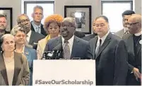  ?? ORLANDO SENTINEL ?? Pastor Robert Ward and other voucher supports gathered in Florida’s capitol Tuesday to denounce efforts to convince corporatio­ns not to fund the state’s largest scholarshi­p program.