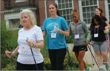  ?? MEDIANEWS GROUP FILE PHOTO ?? A group of educators practice their arm movements during a Nordic walking seminar at Pottstown Middle School for the Healthy Bodies Healthy Minds Institute.