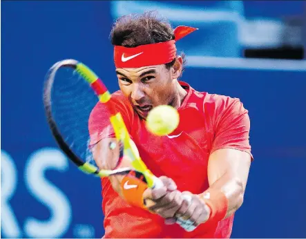  ?? NATHAN DENETTE/THE CANADIAN PRESS ?? Spaniard Rafael Nadal lost the first set to Marin Cilic of Croatia but took the next two to win his quarter-final match at the Rogers Cup Canadian Open men’s tennis championsh­ip in Toronto on Friday. Nadal will face Karen Khachanov in the semifinal Saturday.