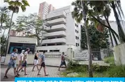  ??  ?? MEDELLIN: Tourists visit the Monaco building, which was once home to Colombian drug lord Pablo Escobar, in Medellin, Colombia. —AFP