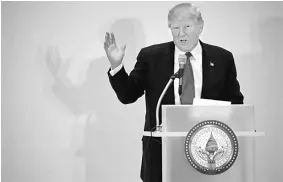  ??  ?? US President Donald Trump delivers remarks at a luncheon with his cabinet members and congressio­nal leaders at Trump Internatio­nal Hotel in Washington, US. — Reuters photo