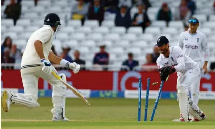  ?? Ben Foakes runs out New Zealand's Tim Southee. Photograph: Andrew Boyers/Action Images/Reuters ??